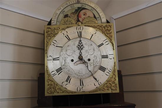 Major Scholfield of Manchester. An early 19th century flame mahogany cased eight day longcase clock, 8ft 6in.